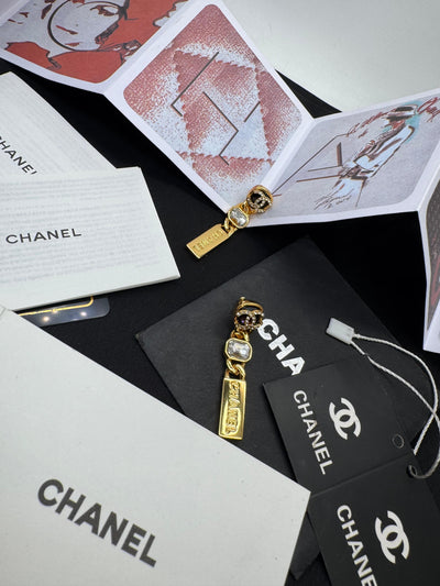 CHANEL Gold Purple Crystal Metal